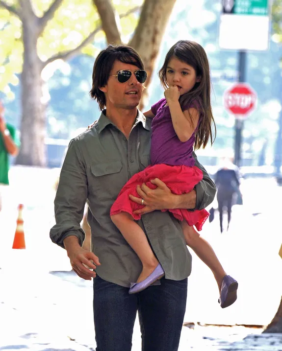 Tom and Suri Cruise visit a Central Park West playground on September 7, 2010 in New York City | Source: Getty Images

